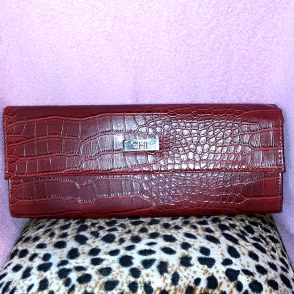 CHI red faux crocodile clutche by Carlos Falchi